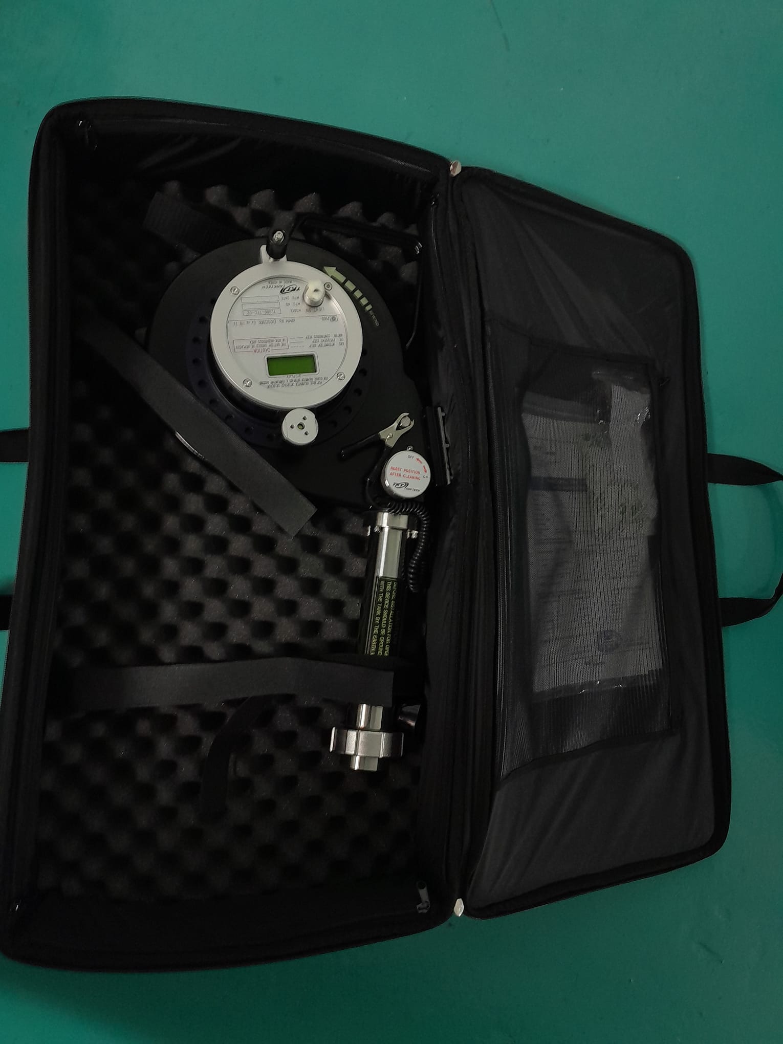 Portable Oil Water Interface Detector and Temperature Gauging ( UTI Meter ), Make TankTech System, Model Model T2000-TFC-02 Gas-Tight(Closed) Portable Tank Measuring system. 30 mtr and 40 mtr.HSN code: 9026.10-2000